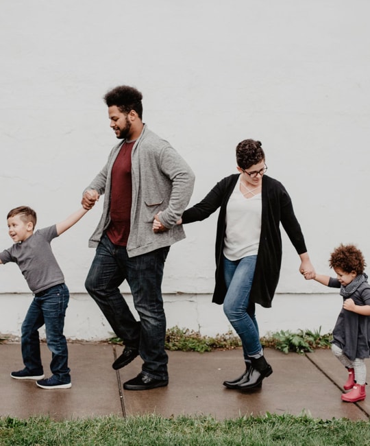  man and woman with two children